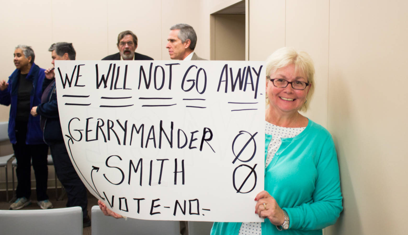 Barbara Wolanin was one of around 30 people protesting the legislature's failure to adopt redistricting reform. (Nick Janzen/IPBS)