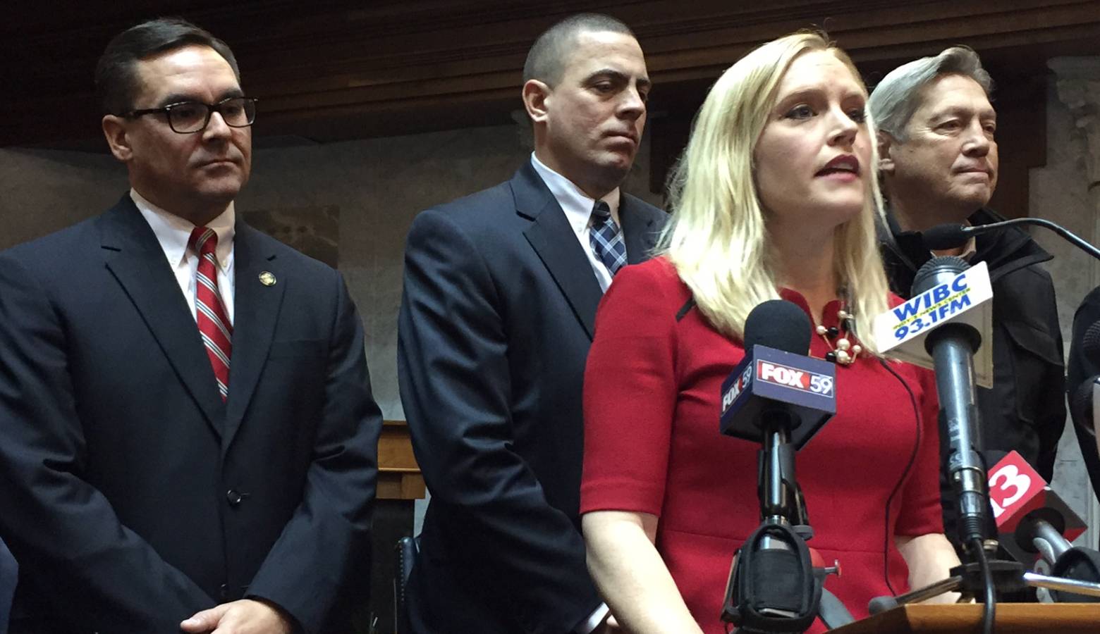Sen. Erin Houchin (R-Salem) is surrounded by Indiana prosecutors when she announces in 2016 she'll author the felony arrestee DNA bill. (Brandon Smith/IPB News)
