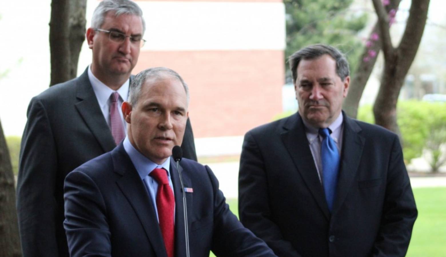 EPA Administrator Scott Pruitt addresses reporters during an April visit to East Chicago, Indiana, with state and local officials including Gov. Eric Holcomb and U.S. Sen. Joe Donnelly. (Annie Ropeik/IPB News)