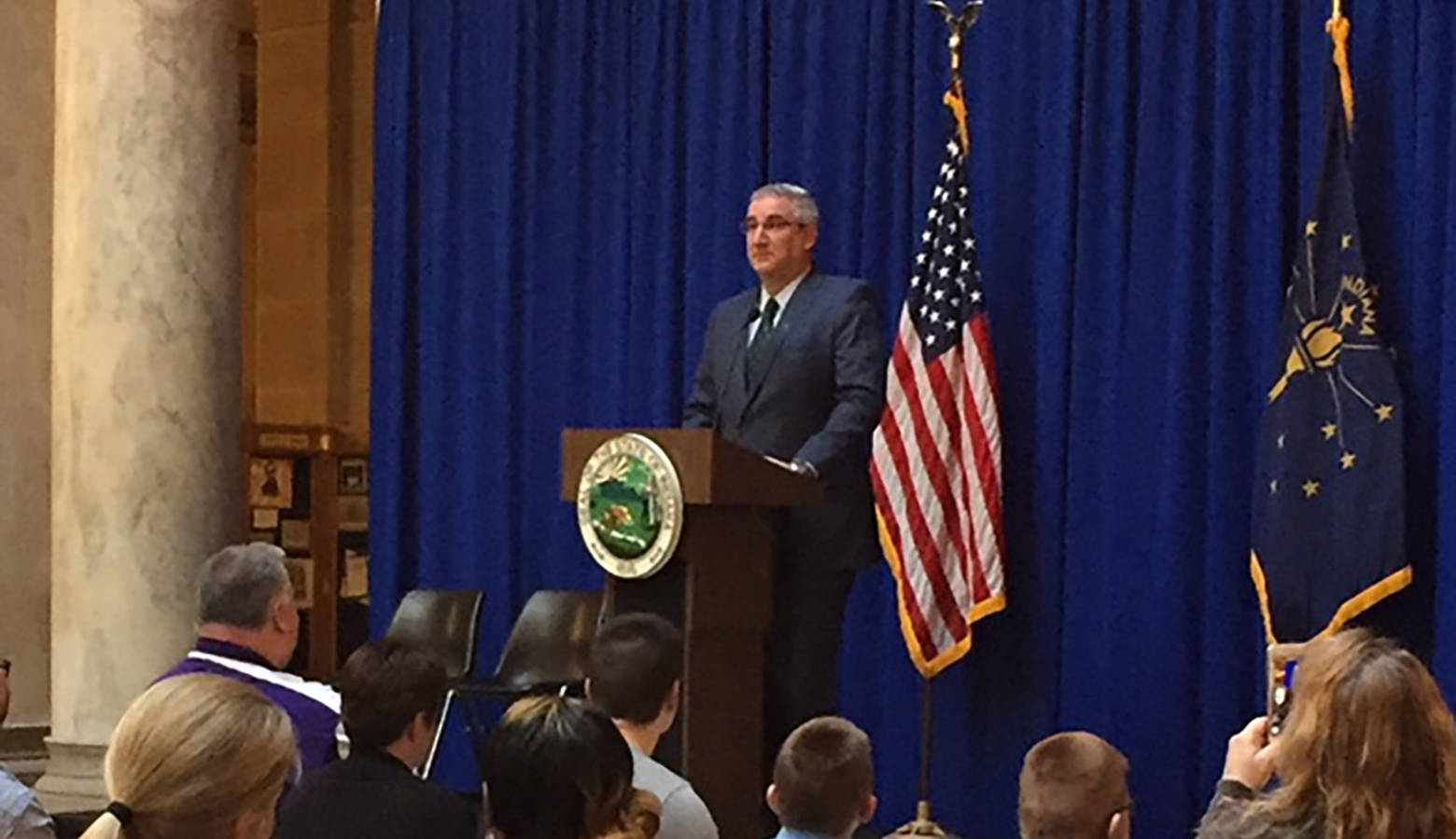 Gov. Eric Holcomb speaks to foster families at the Statehouse. (Jill Sheridan/IPB News)