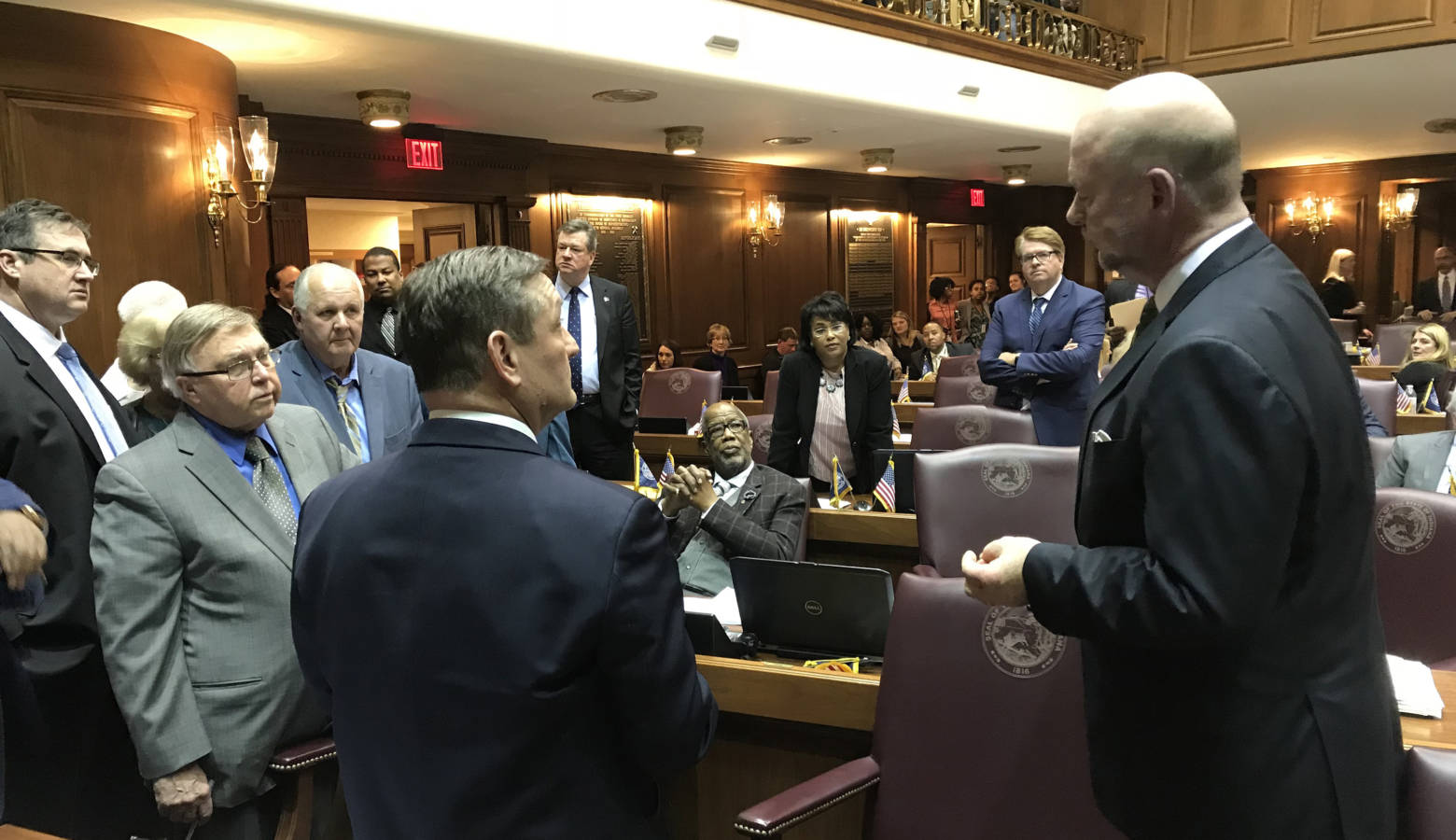 Speaker Brian Bosma (R-Indianapolis), right, tries to negotiate with Democrats on the House floor as the session's clock ran out. (Brandon Smith/IPB News)