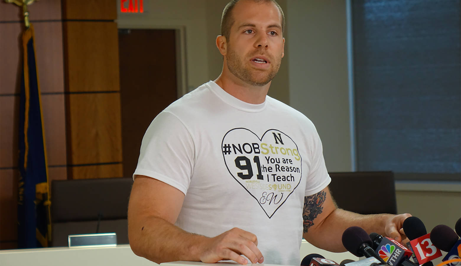 Seventh grade teacher Jason Seaman, who is credited with tackling the shooter at Noblesville West Middle School, speaks at a press conference Monday. (Eric Weddle/WFYI News)