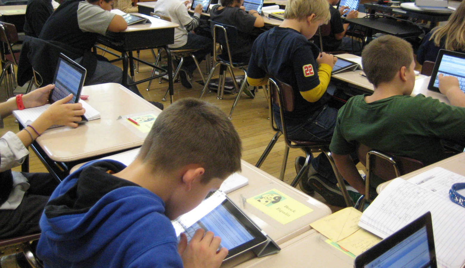 Student take a writing assessment using tablets. (BarbaraLN/Flickr)