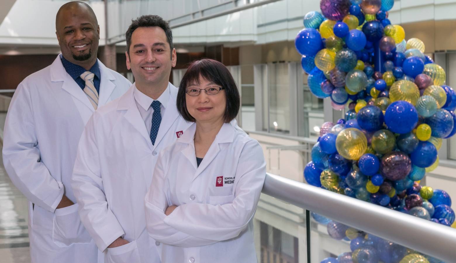 Indiana University School of Medicine Dr. Burcin Ekser (middle) and some of the team of researchers who work on organ transplant technology. (Photo courtesy Indiana University School of Medicine)