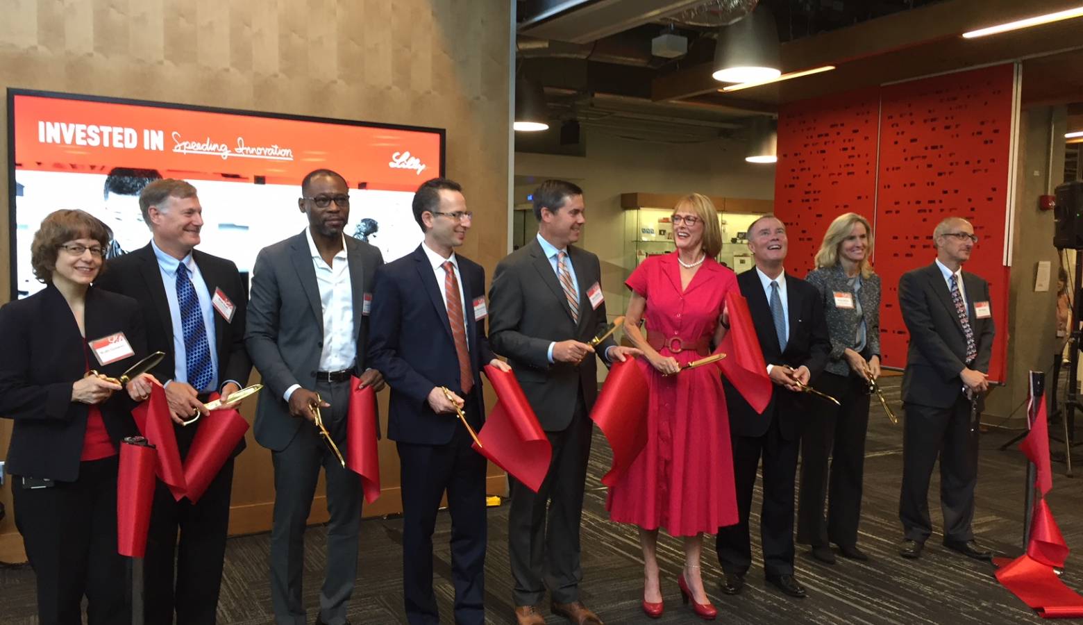 Eli Lilly leaders join state and city officials for ribbon cutting at "Building 302." (Jill Sheridan/IPB News)
