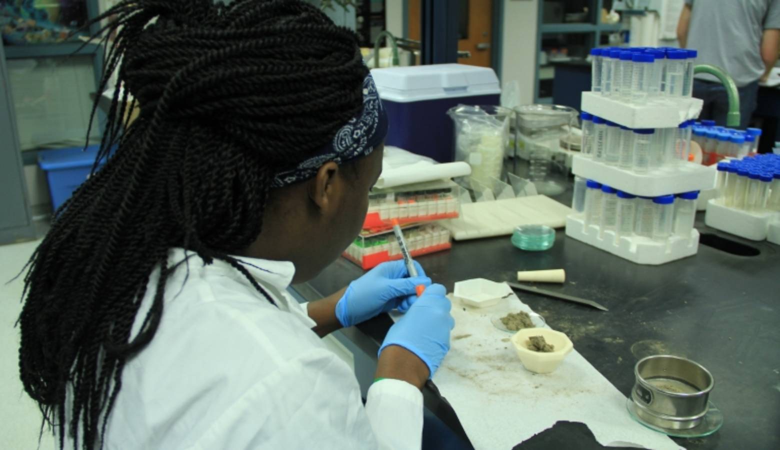 Isheka Orr analyzes dust in the lab. Orr, from Claflin University, is participating in IUPUI's Diversity Summer Undergraduate Research Opportunity Program. (Photo courtesy IUPUI)