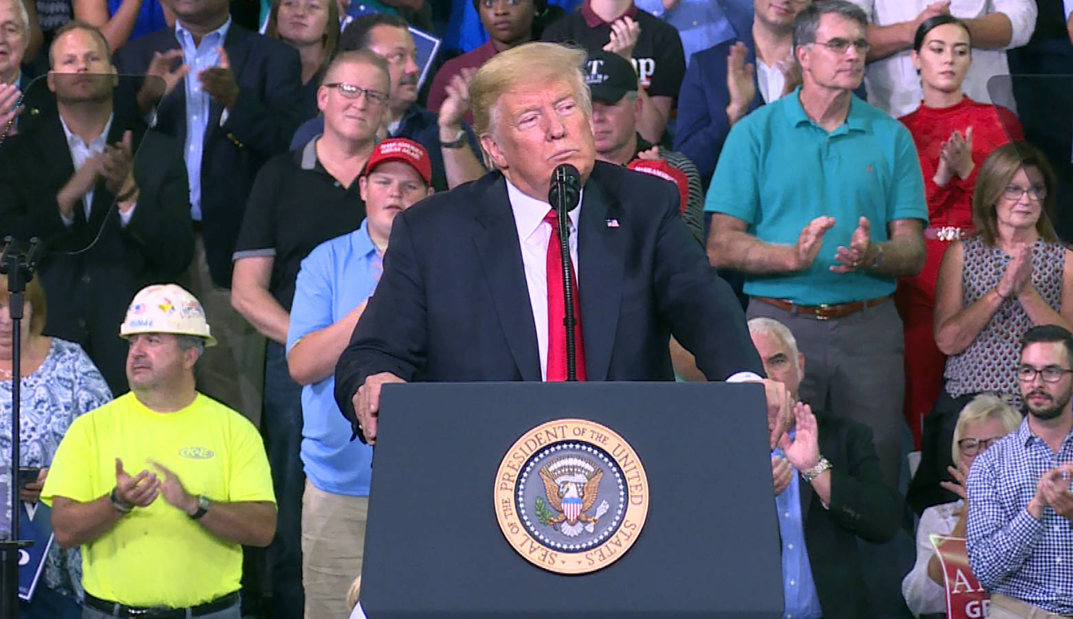 President Donald Trump speaks to the crowd in Evansville where he endorsed Republican Senate candidate Mike Braun. (Alex Eady/WTIU)
