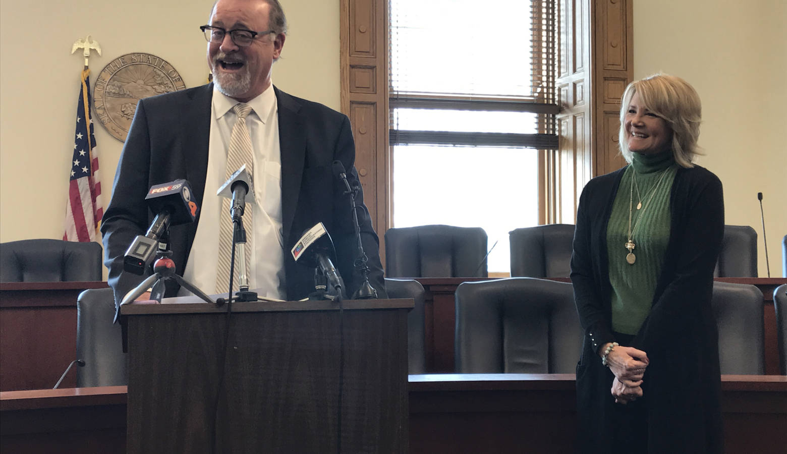 Sen. David Long (R-Fort Wayne), alongside his wife Melissa, announced his retirement at a press conference in February. It takes effect Nov. 6. (Brandon Smith/IPB News)