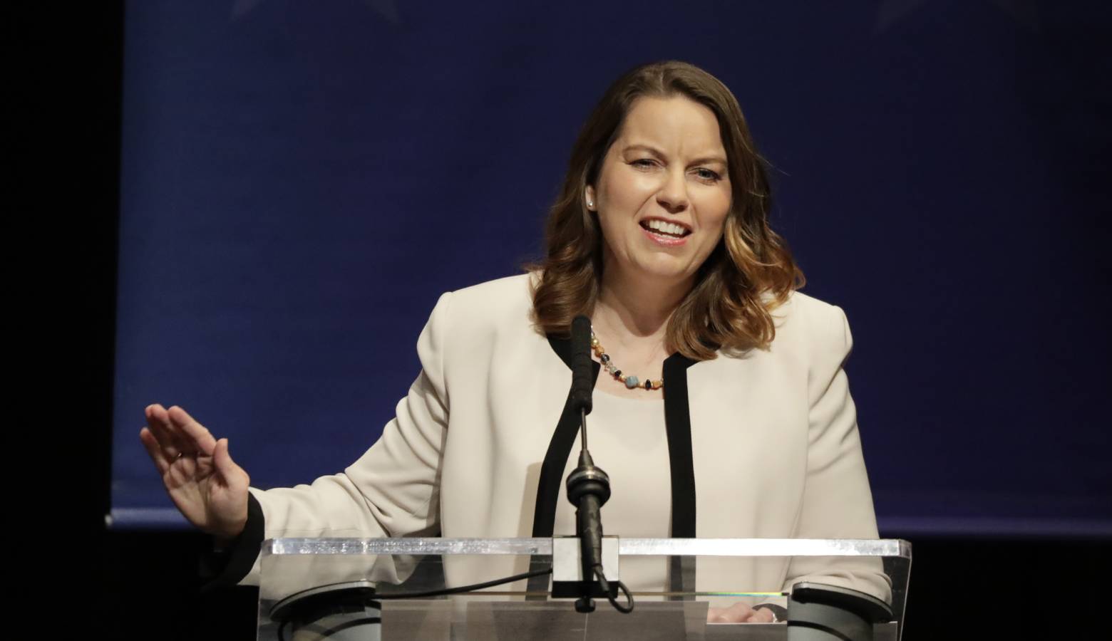 Libertarian candidate Lucy Brenton relishes the chance to play the spoiler in Indiana’s crucial U.S. Senate race. (Courtesy of Indiana Debate Commission, Darron Cummings/AP)