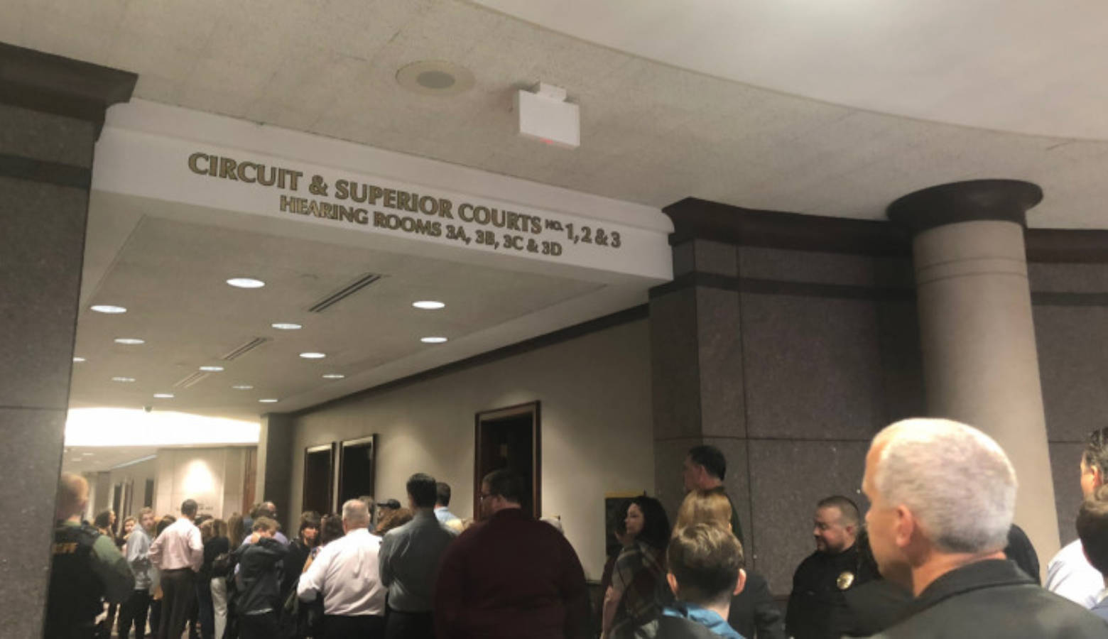 A line formed outside the Hamilton County Circuit Court Monday, Nov. 5. Not everyone got a seat in the courtroom for hearing of the juvenile accused of shooting classmate and teacher at Noblesville West Middle School.