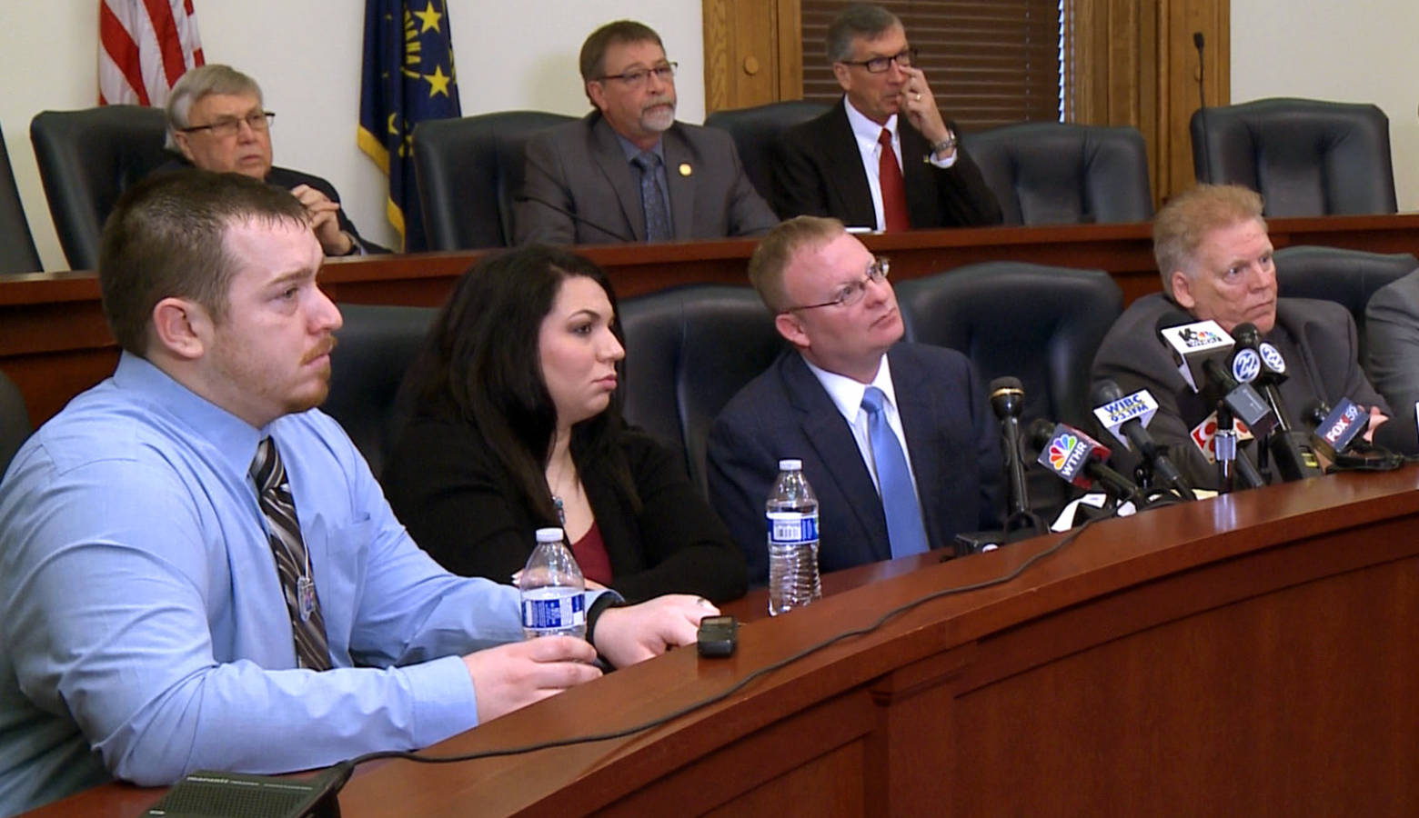 A group of lawmakers joined Shane and Brittany Ingle and Michael Schwab, the family of the three children killed October, at a meeting Tuesday to announce and advocate for bus safety-focused legislation. (Tyler Lake/WTIU)