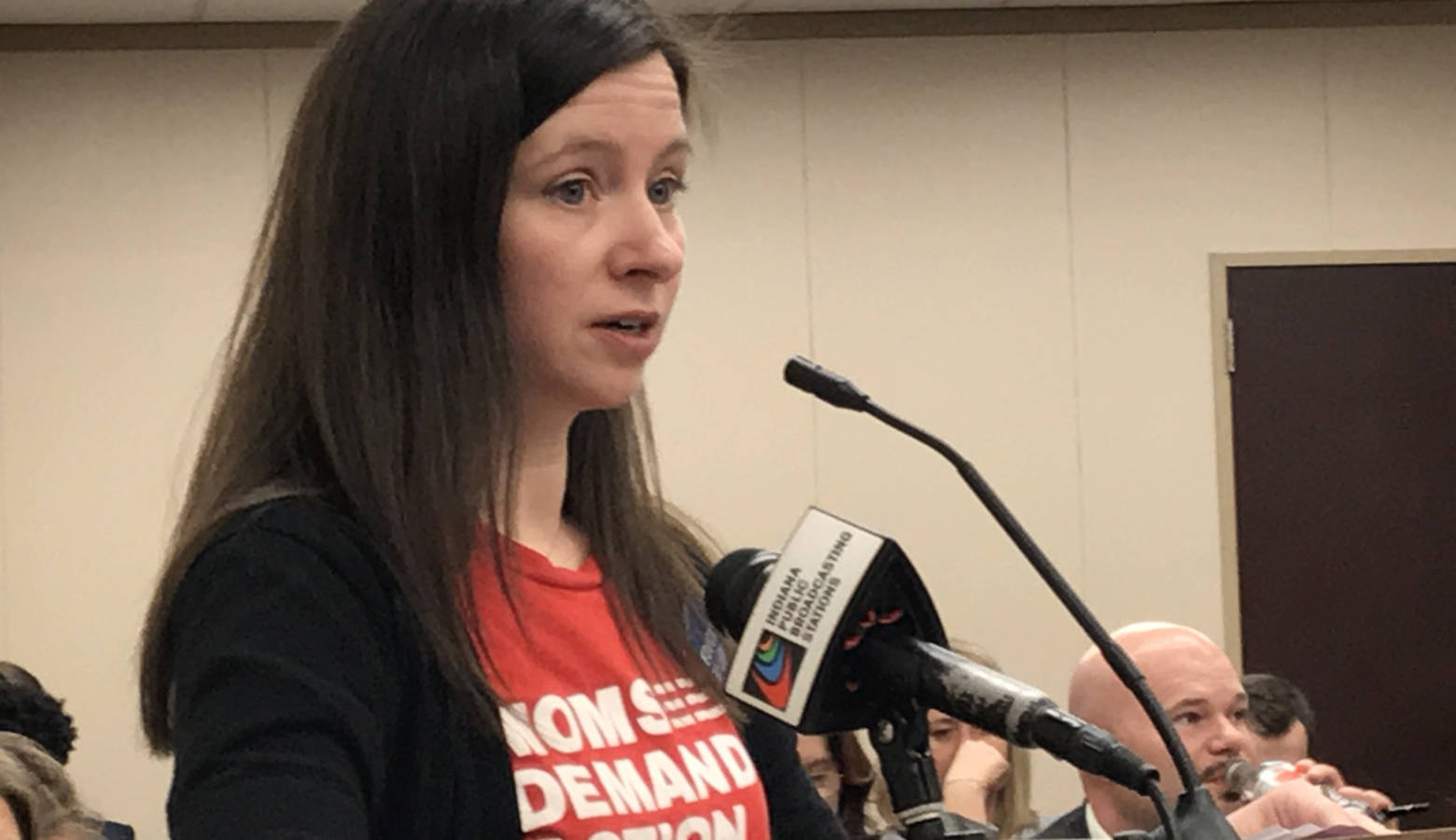 Bloomington resident Courtney Dailey is one of several members of Moms Demand Action who showed up at a House committee to oppose a gun bill. (Brandon Smith/IPB News)