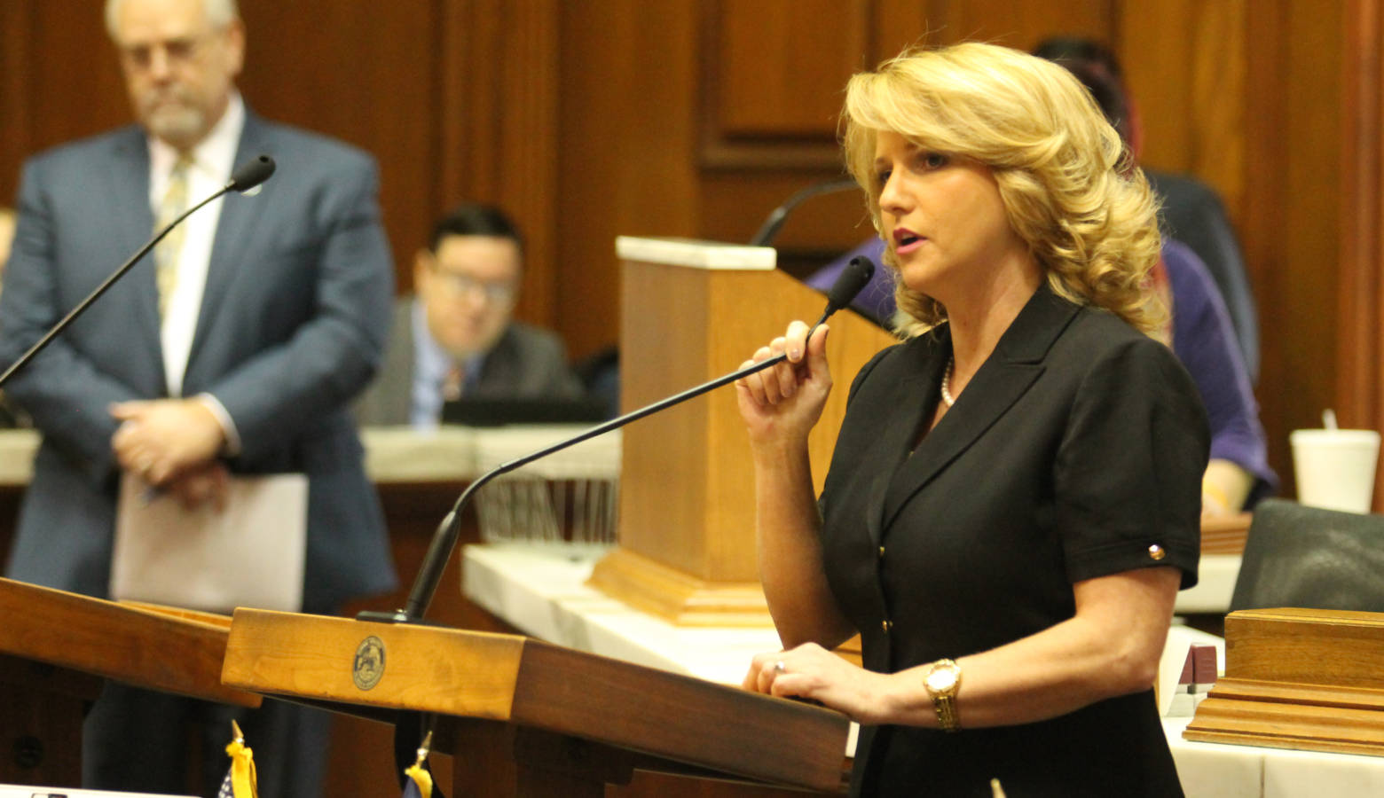 Rep. Karlee Macer speaks on the House floor. (Lauren Chapman/IPB News)