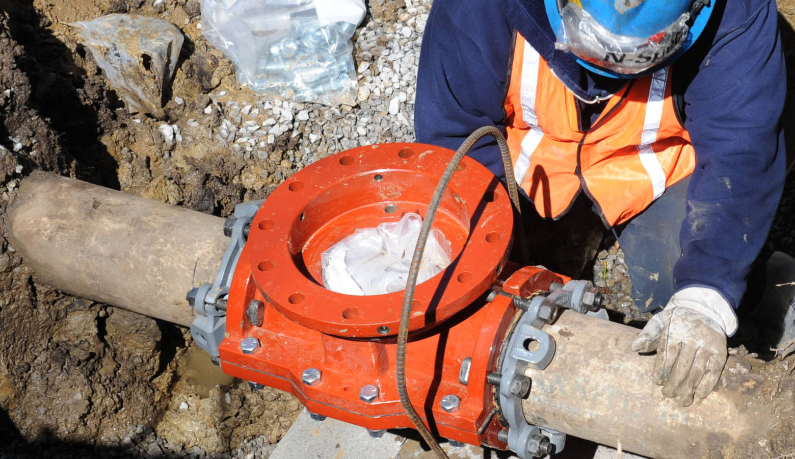 Workers replace a water main valve at Scott Air Force Base in Illinois, 2011. Indiana American Water plans to replace more than 30 miles of water mains in Indiana (U.S. Air Force)