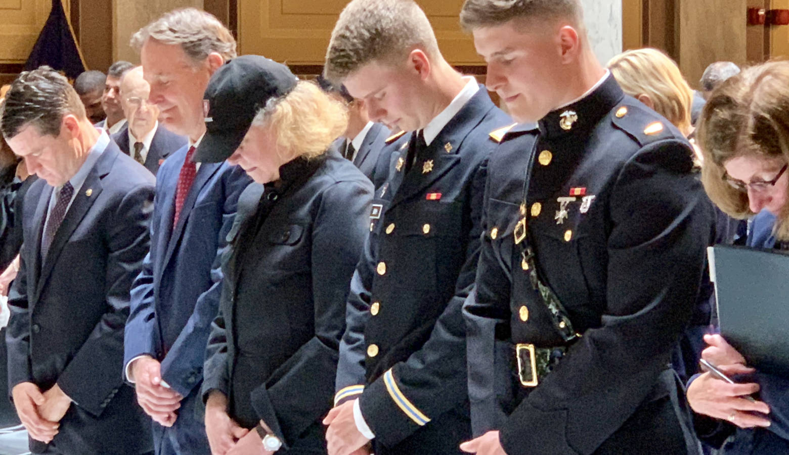 Evan Bayh, left, with his wife Susan and sons Nick and Beau at the Statehouse memorial for Evan's father, Birch Bayh. (Brandon Smith/IPB News)