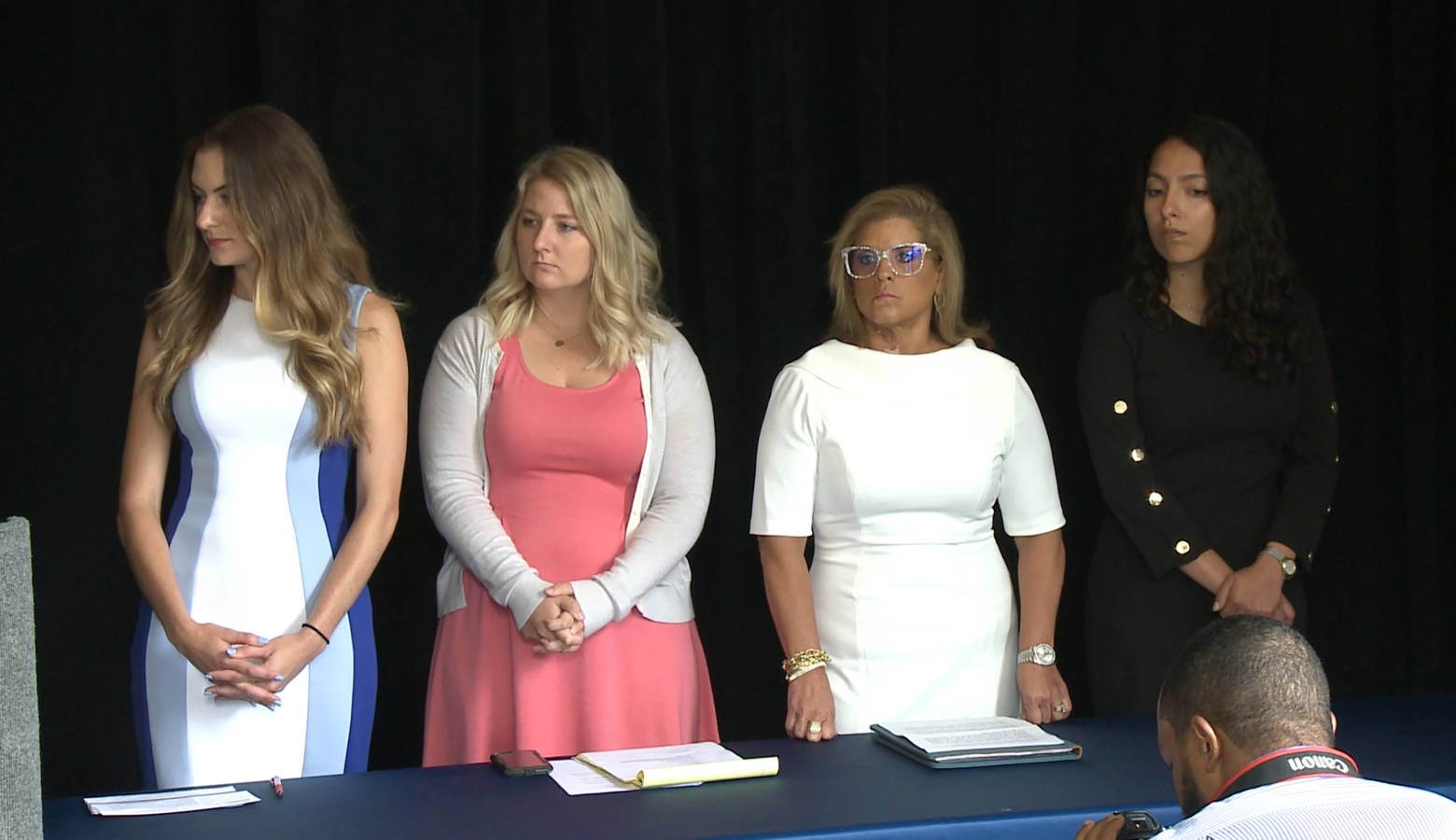 From left, Niki DaSilva, Gabrielle McLemore, Rep. Mara Candelaria Reardon (D-Munster) and Samantha Lozano at a press conference announcing they're suing Curtis Hill and the state of Indiana. (Zach Herndon/WTIU)