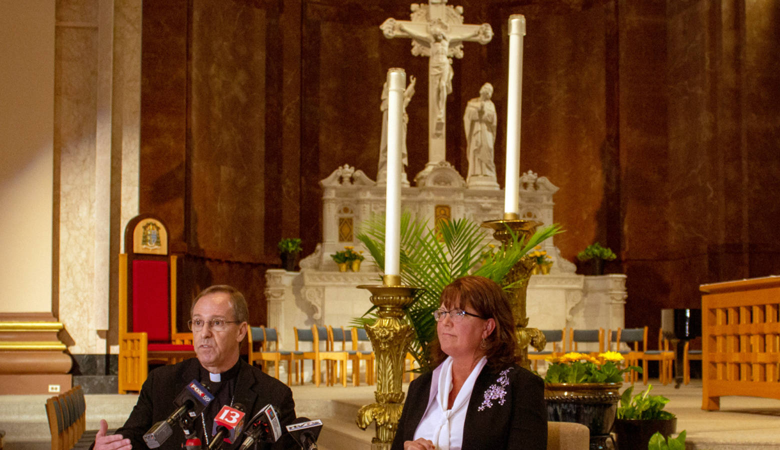 Archbishop Charles Thompson and Superintendent of Catholic Schools Gina Fleming defend the Archdiocese's policy on LGBTQ teachers at Catholics schools. (Evan Robbins/WFYI News)