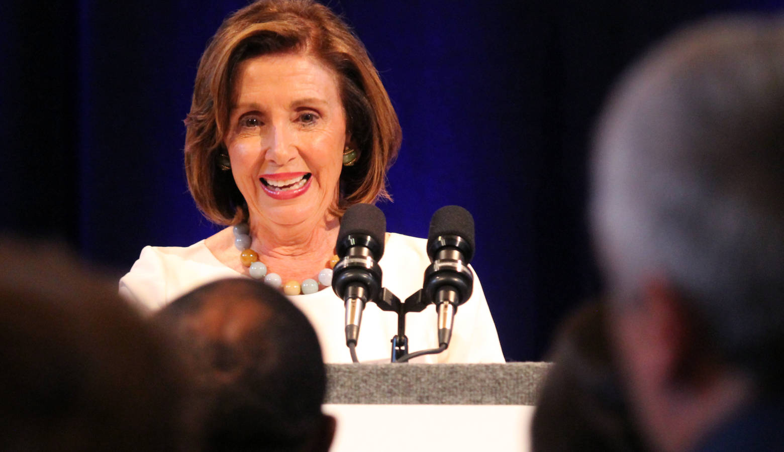 House Speaker Nancy Pelosi (D-Calif.) speaks at the Young Democrats National Convention in Indianapolis on Friday July 19. Pelosi smiles as the crowd begins chanting "Nancy." (Lauren Chapman/IPB News)