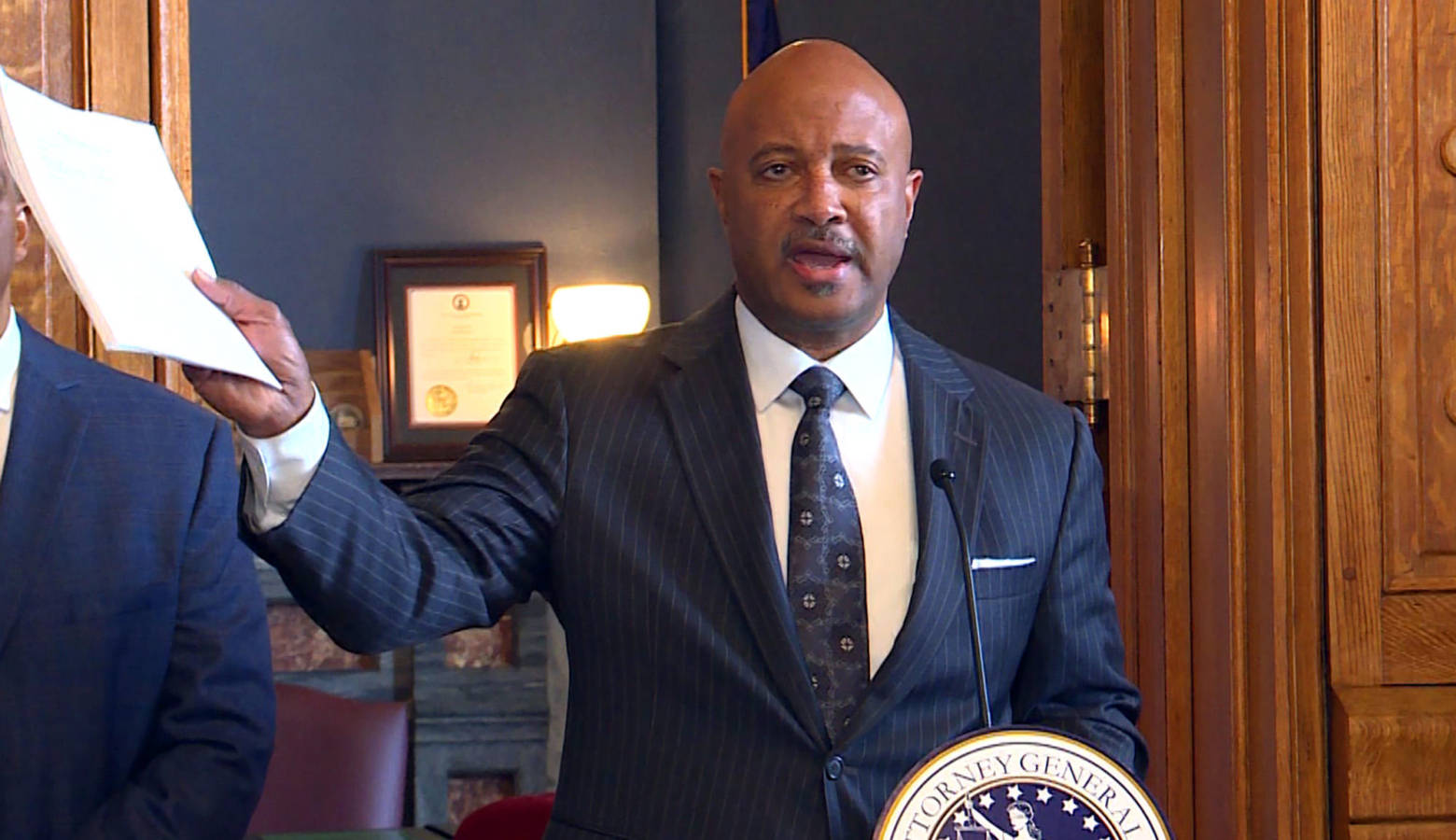 Attorney General Curtis Hill holds the 92 page complaint against opioid manufacturer Purdue Pharma during a November 2018 press conference. The recent decision in Oklahoma against Johnson & Johnson alleged similar complaints. (Lauren Chapman/IPB News)