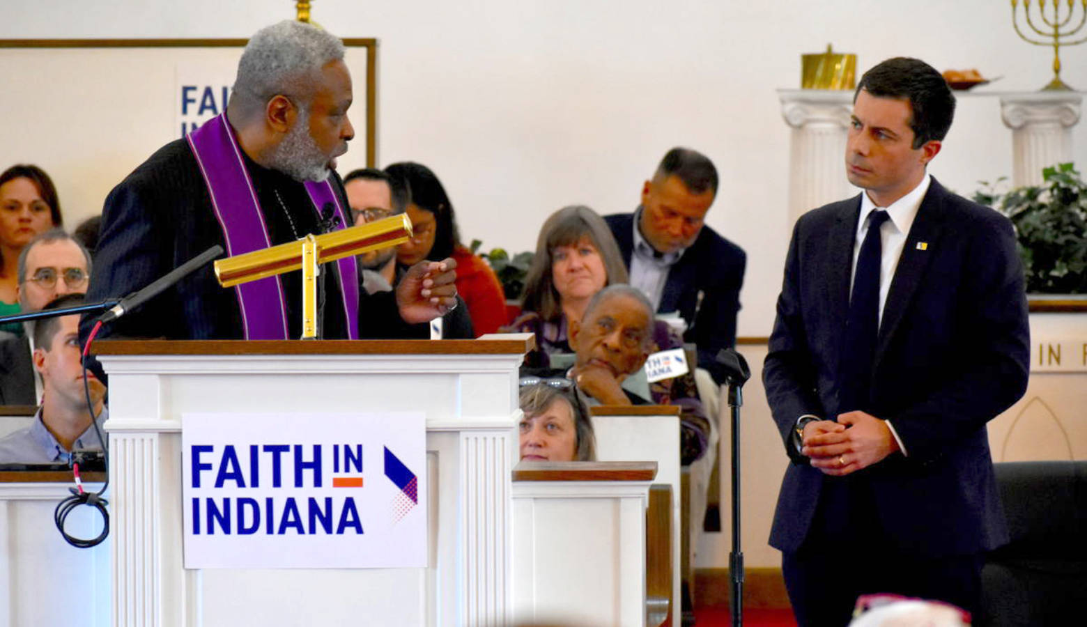 Rev. Gilbert Washington asks South Bend Mayor Pete Buttigieg questions on behalf of Faith in Indiana. (Justin Hicks/IPB News)