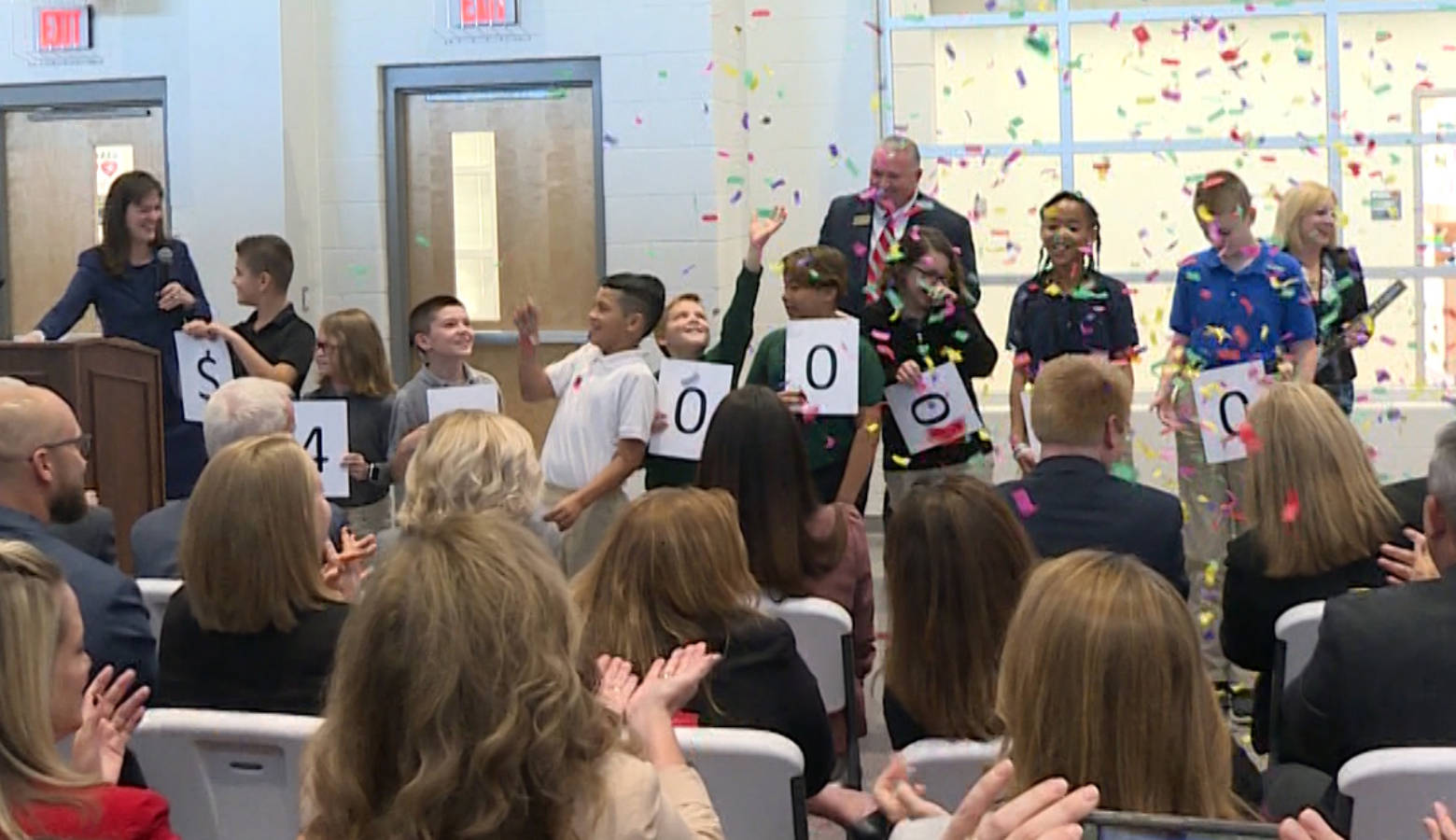 Students helped announce how much funding the grant award included, at a school in the Perry Township district Tuesday. (Jeanie Lindsay/IPB News)