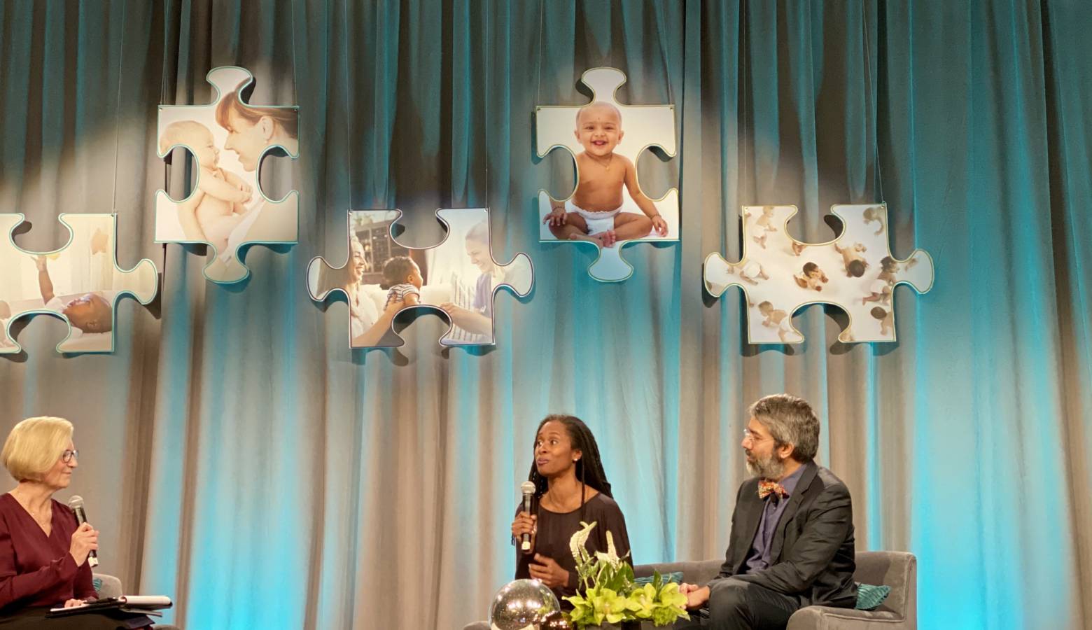 State Health Commissioner Kris Box discusses infant mortality with Dr. Nzinga Harrison and Dr. Dipesh Navsaria at the Labor of Love Summit Dec. 11. (Darian Benson/IPB News)