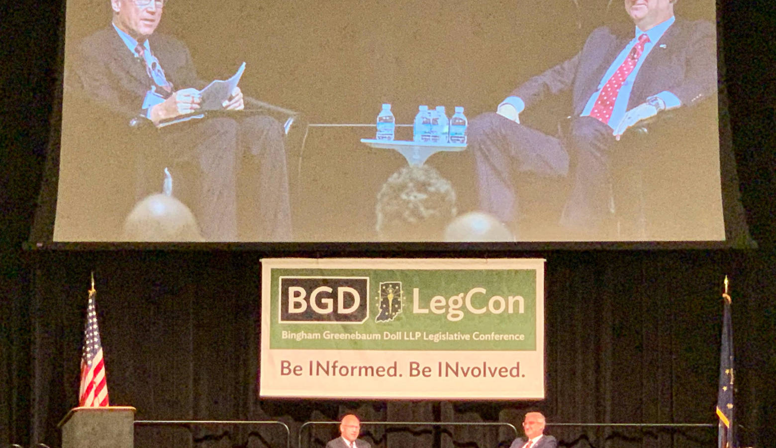 Gov. Eric Holcomb, right, speaks at the 2019 Bingham Greenebaum Doll Legislative Conference. (Brandon Smith/IPB News)