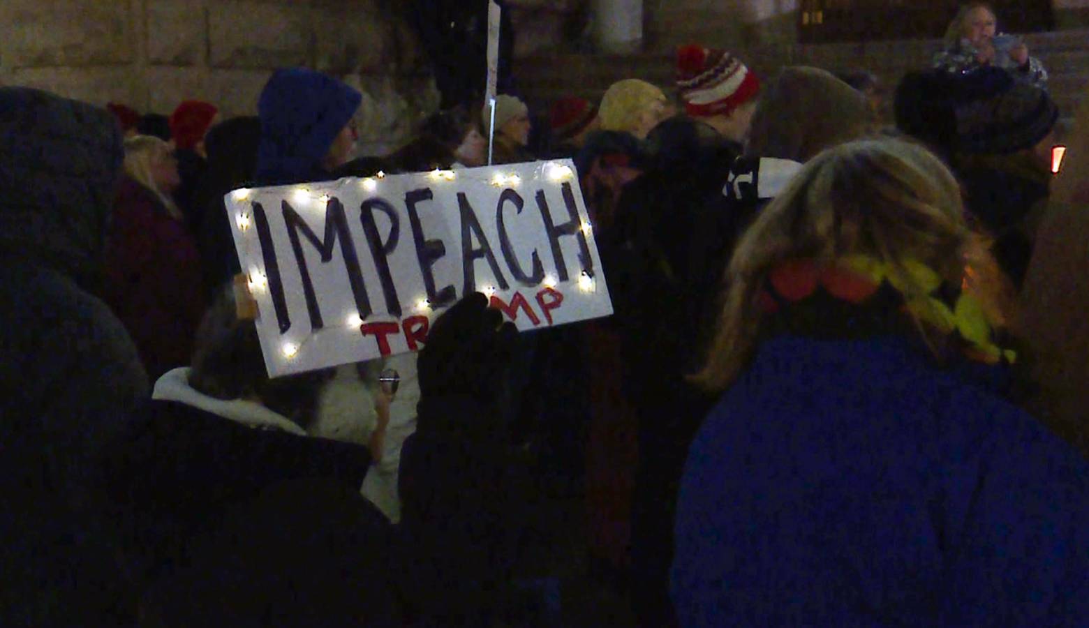 More than 100 people gathered on the steps of the Indiana Statehouse Tuesday to call on Congress to impeach President Donald Trump. (Lauren Chapman/IPB News)