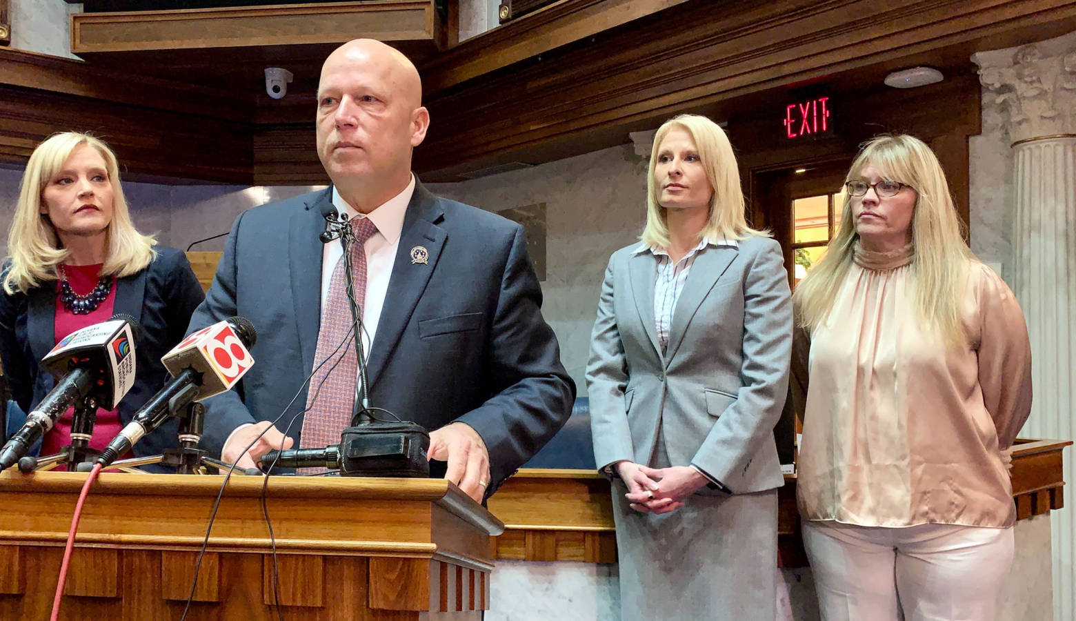 Sen. Mike Crider (R-Greenfield) talks about his legislation with Sen. Erin Houchin (R-Salem), left, and sexual assault prevention advocates supporting him. (Brandon Smith/IPB News)