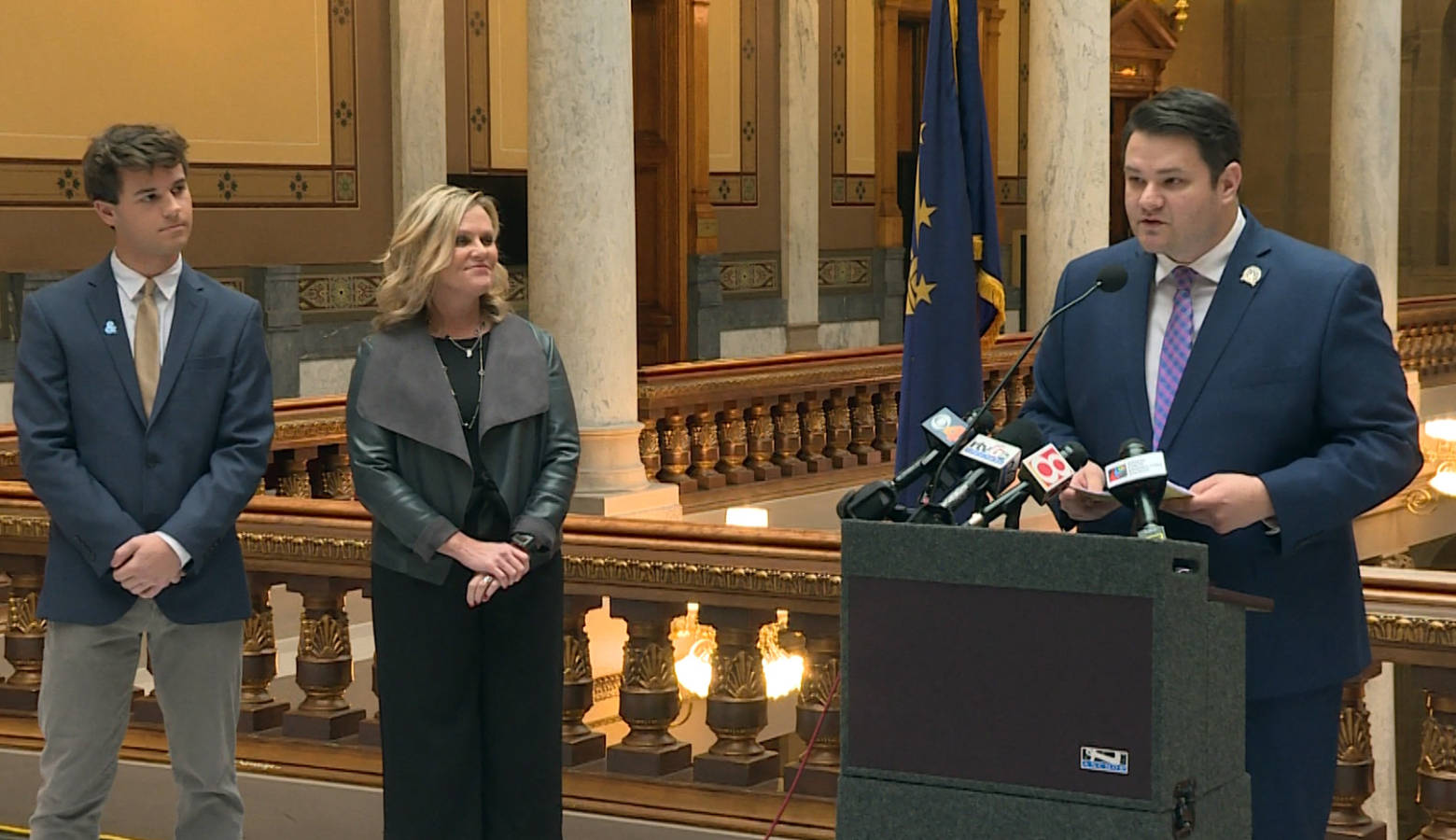 (Left to right) Dominic Conover, State Superintendent Jennifer McCormick and Sen. J.D. Ford announced the anti-discrimination bill at the statehouse Friday. (Jeanie Lindsay/IPB News)