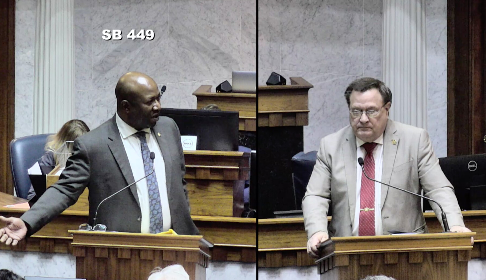 Sen. Greg Taylor (D-Indianapolis), left and Sen. Mike Young (R-Indianapolis) debate the juvenile sentencing bill on the Senate floor. (Courtesy of the Indiana General Assembly)