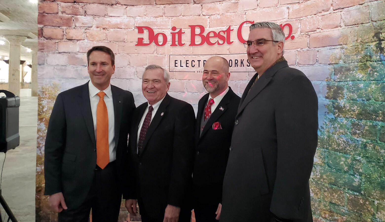 (Left to right) President and CEO Dan Starr, Fort Wayne Mayor Tom Henry, RTM Ventures partner Jeff Kingsbury and Gov. Eric Holcomb pose for a photo following the announcement. (Samantha Horton/IPB News)