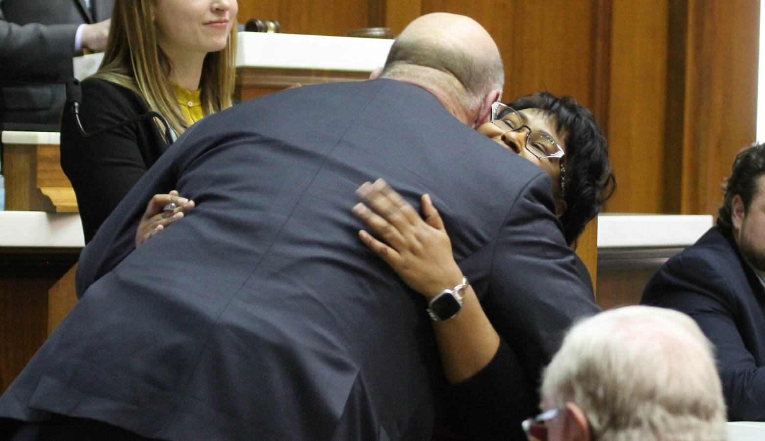 Rep. Brian Bosma (R-Indianapolis) and Rep. Cherrish Pryor (D-Indianapolis) embrace on the House floor. (Lauren Chapman/IPB News)