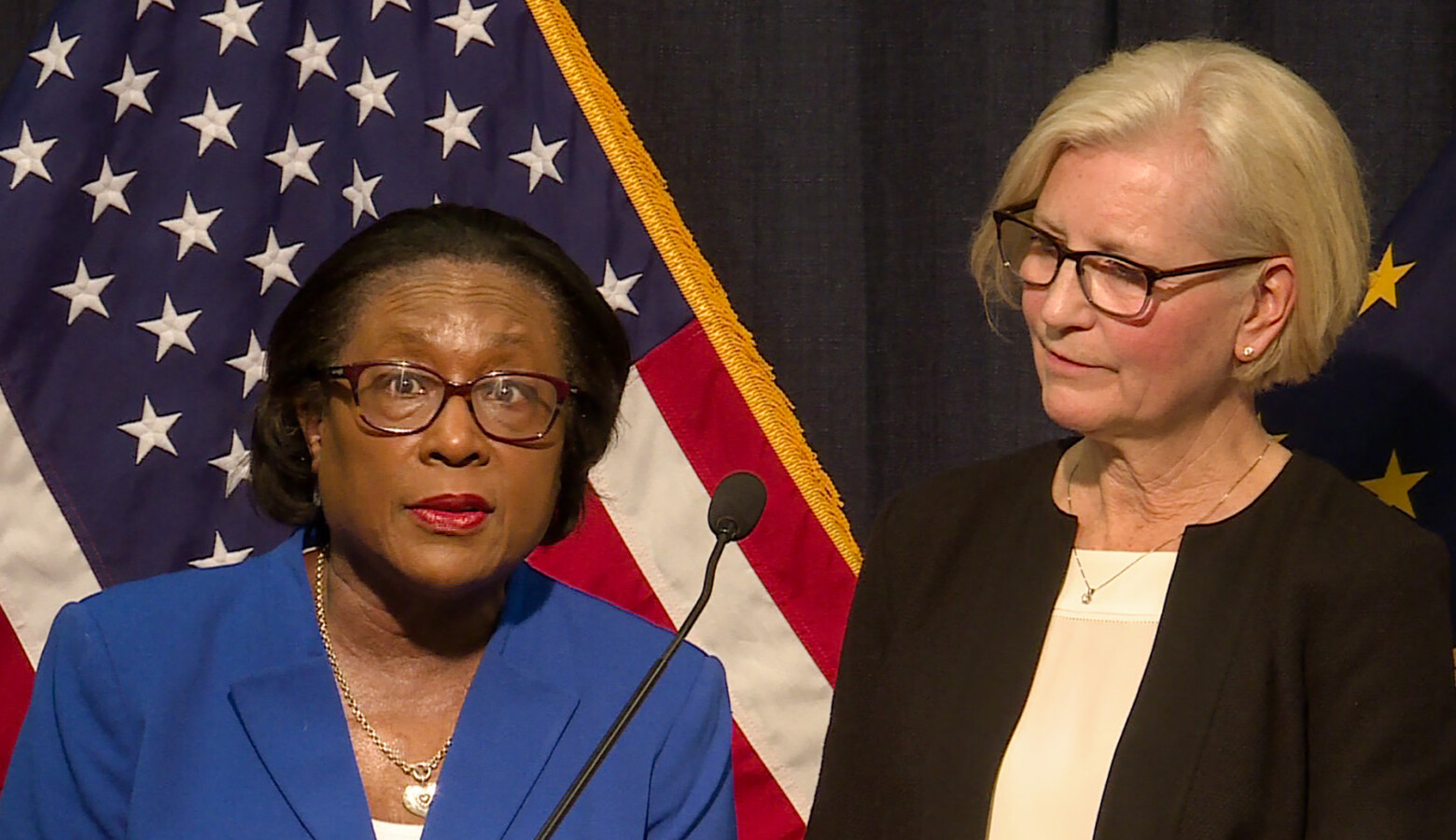 Marion County Health Department Director Virginia Caine and State Health Commissioner Kris Box speak at a press conference Friday. They say an adult man was at a conference in Boston where he was exposed to COVID-19. (Lauren Chapman/IPB News)