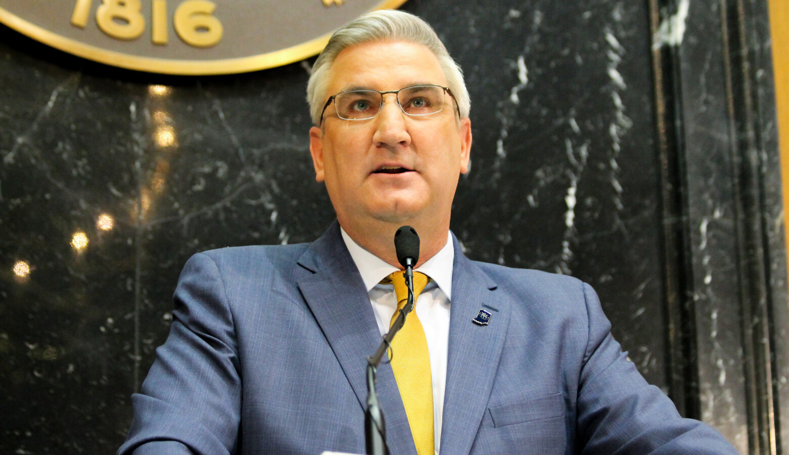 Gov. Eric Holcomb speaks at his third State of the State address. He's expected to speak Monday on the latest developments in slowing the spread of COVID-19. (Lauren Chapman/IPB News)