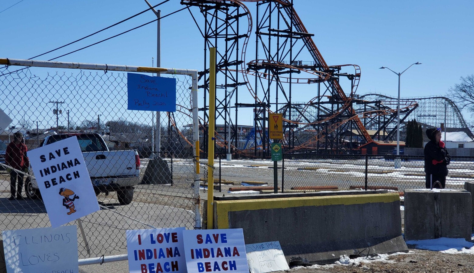 Signs left outside the main gate to Indiana Beach during the rally to save the amusement park in March. (Samantha Horton/IPB News)