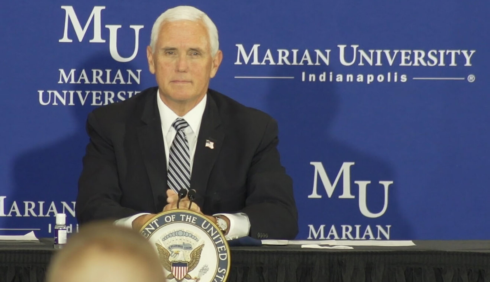 During a roundtable discussion hosted by Marian University in Indianapolis, Pence highlighted the many wraparound services K-12 schools provide. (Alan Mbathi/IPB News)