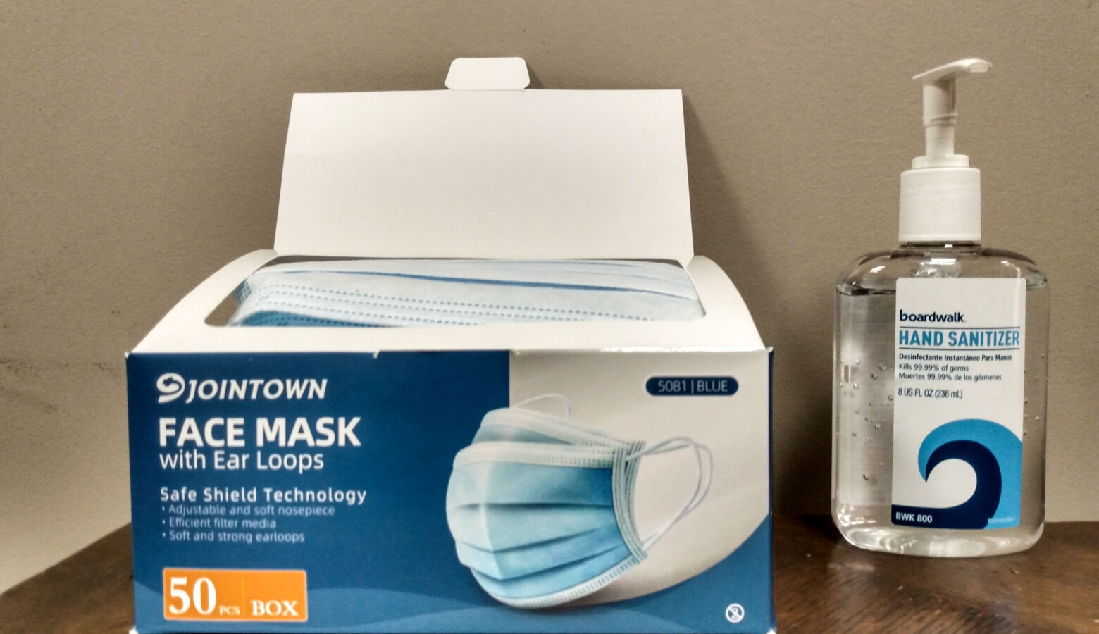 Many businesses are offering hand sanitizer and disposable face masks at their entrances. (Lauren Chapman/IPB News)