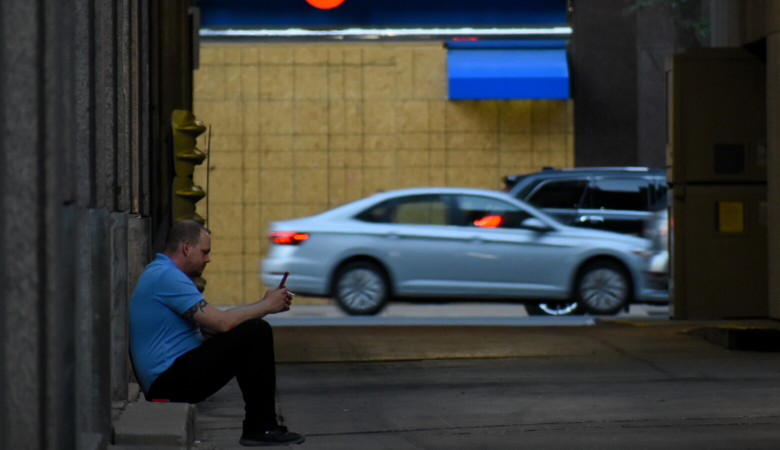 A worker in downtown Indianapolis takes a smoke break. (Justin Hicks/IPB News)