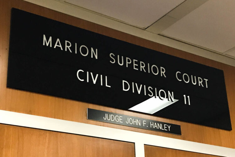 A sign that reads "Marion Superior Court Civil Division 11" with a smaller sign below it that reads "Judge John F. Hanley."